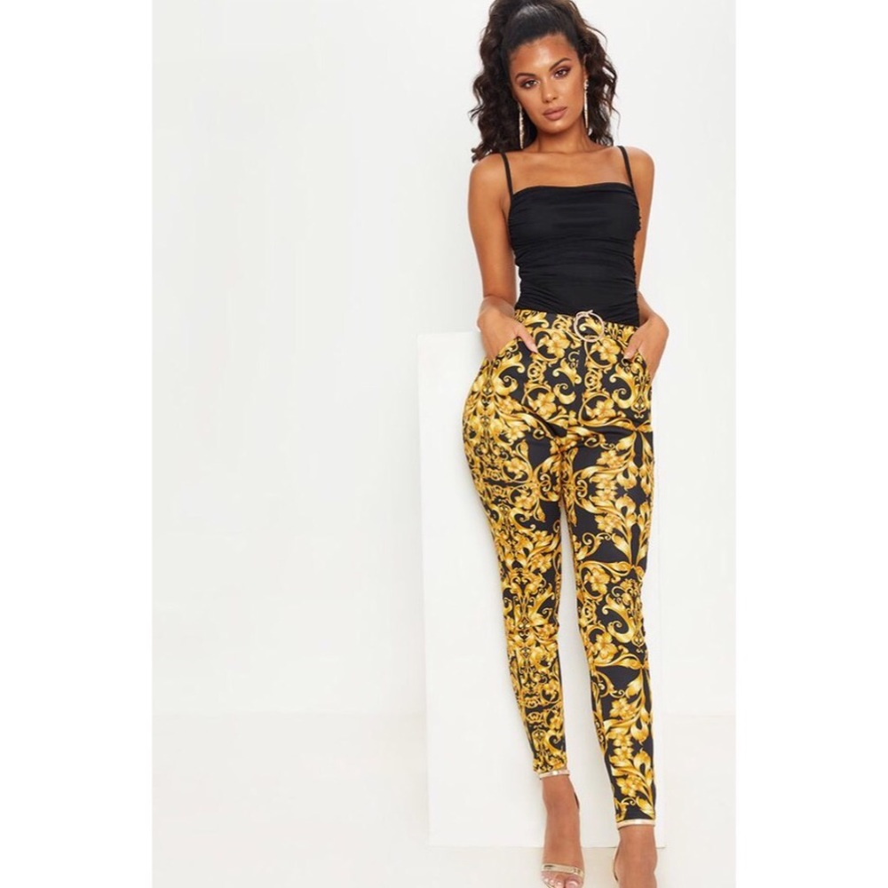 Fashion nova black and gold print joggers